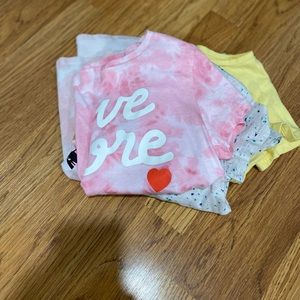 • bundle of four girls shirts •